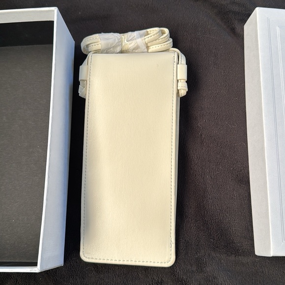Sunglasses or phone holder crossbody bagNew without tagColor: Cream